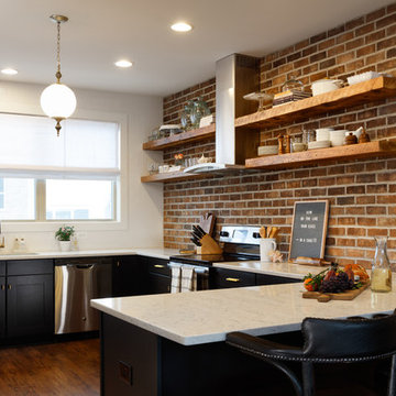 Brick Walled Kitchen with Open Shelving.