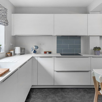 Bright white family kitchen with a touch of blue