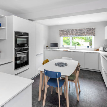 Bright white family kitchen with a touch of blue
