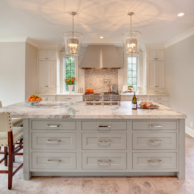 Inspiration for a transitional kitchen remodel in Seattle with an island and white countertops