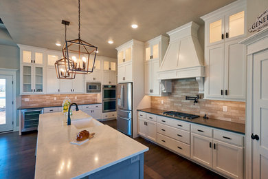 Example of a classic kitchen design in Other with flat-panel cabinets, white cabinets and quartz countertops