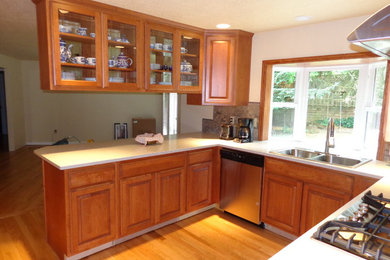 Large u-shaped kitchen photo in Portland
