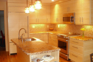 Example of a small trendy l-shaped medium tone wood floor eat-in kitchen design in Philadelphia with an undermount sink, flat-panel cabinets, light wood cabinets, onyx countertops, multicolored backsplash, mosaic tile backsplash, paneled appliances and an island