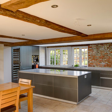 bulthaup dark aluminium kitchen in farmhouse