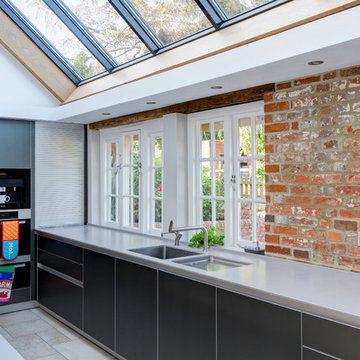 bulthaup dark aluminium kitchen in farmhouse