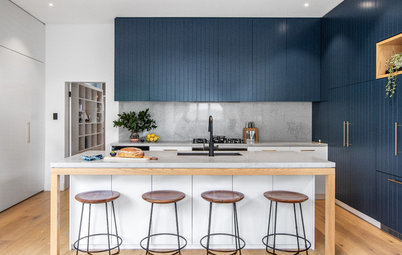 Room of the Week: A Compact Kitchen With a Stylish Hidden Laundry