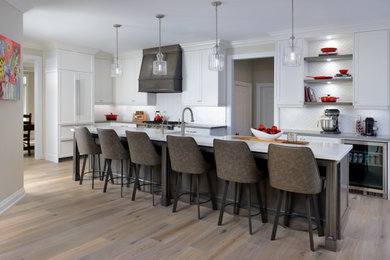 Photo of an expansive contemporary kitchen in Toronto with multiple islands.