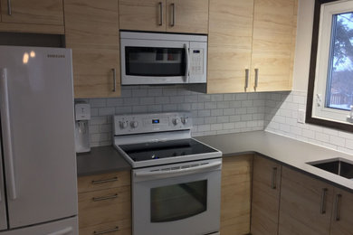 Minimalist kitchen photo in Edmonton