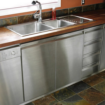 Butcher-block top on stainless steel cabinets