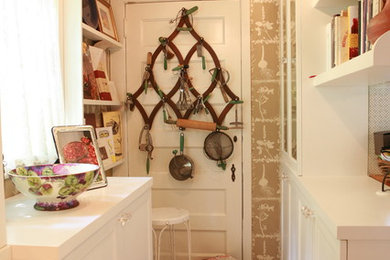 Example of a small classic ceramic tile kitchen pantry design in Other with shaker cabinets, white cabinets, wood countertops, metallic backsplash and white appliances