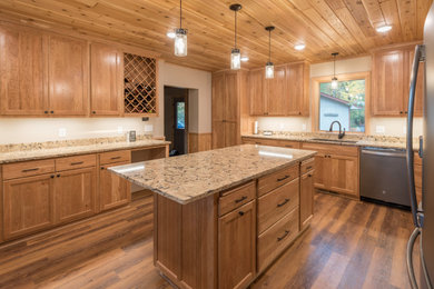 Large mountain style wood ceiling eat-in kitchen photo in Minneapolis with recessed-panel cabinets, light wood cabinets, quartz countertops, an island and multicolored countertops