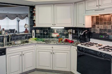 Kitchen - traditional kitchen idea in Baltimore with raised-panel cabinets, white cabinets, granite countertops, gray backsplash and ceramic backsplash