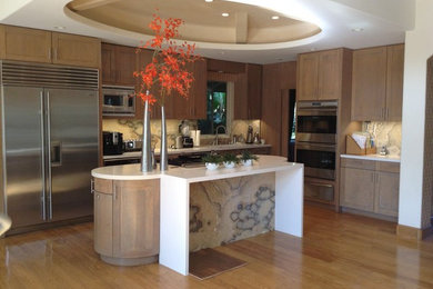 Large galley brown floor kitchen photo in San Diego with beaded inset cabinets, brown cabinets, beige backsplash and brown countertops