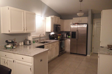 Example of a small transitional kitchen design in Milwaukee