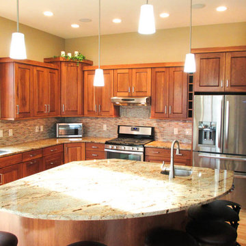 Calico Hickory cabinets w/ Brown Sugar stain and Golden Crystal granite