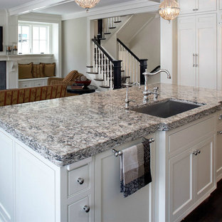 Inspiration for a large victorian separate kitchen in Other with an undermount sink, recessed-panel cabinets, white cabinets, quartz benchtops, dark hardwood floors and with island.