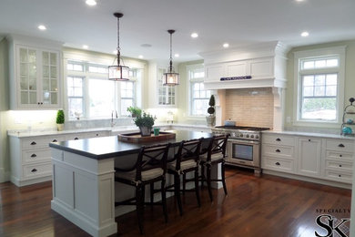 Eat-in kitchen - large traditional l-shaped eat-in kitchen idea in Boston