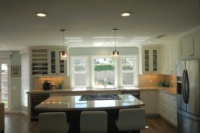 Mid-sized beach style l-shaped open concept kitchen photo in San Diego with two islands