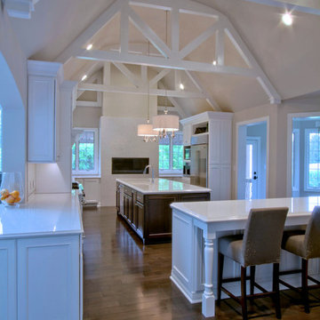 Carmel White Kitchen Renovation with Vaulted and Beamed Ceiling