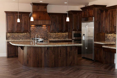 Inspiration for a large craftsman porcelain tile and multicolored floor eat-in kitchen remodel in Salt Lake City with a double-bowl sink, dark wood cabinets, granite countertops, brown backsplash, marble backsplash, stainless steel appliances and an island