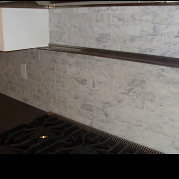 Carrara Marble and white Cabinet Kitchen