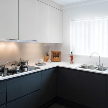 Charcoal grey and white Monochrome enclosed kitchen