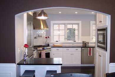 Example of a cottage kitchen design in Denver