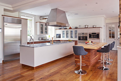Example of an urban kitchen design in Surrey