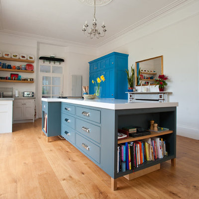 Inspiration for a contemporary kitchen remodel in Cornwall with shaker cabinets and blue cabinets