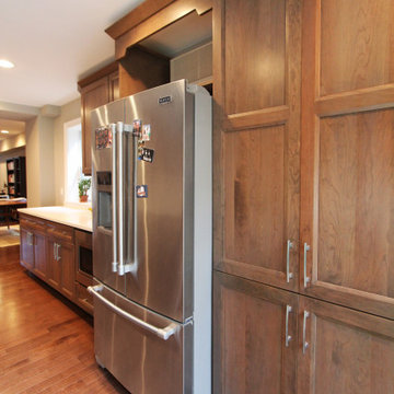 Cherry Cabinet Pantry Space with Inset Refrigerator