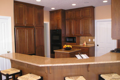 Example of a classic kitchen design in Other