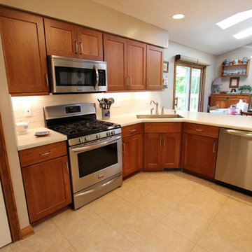 Cherry Kitchen Cabinets with Corian Countertops ~ Broadview Heights, OH