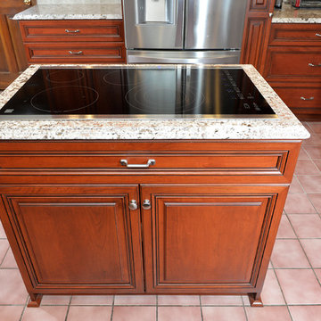 Cherry Kitchen with Cooktop Island in Manassas, VA