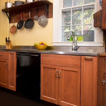 Cherry Kitchen with Steel and Butcher Block Countertops