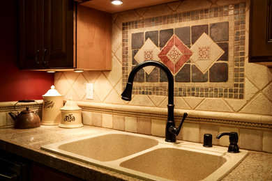 フィラデルフィアにある低価格のコンテンポラリースタイルのおしゃれなII型キッチン (御影石カウンター、シルバーの調理設備) の写真