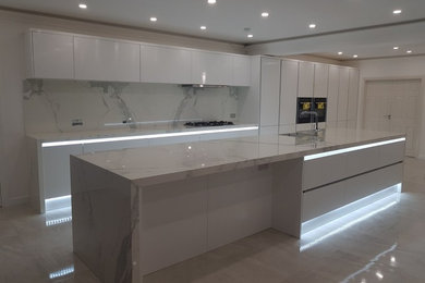 Inspiration for a modern kitchen in London with quartz worktops and white worktops.