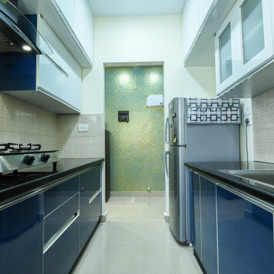 Kitchen - modern galley kitchen idea in Bengaluru