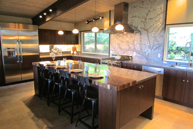 Large mid-century modern u-shaped porcelain tile open concept kitchen photo in San Francisco with an undermount sink, flat-panel cabinets, dark wood cabinets, quartz countertops, multicolored backsplash, mosaic tile backsplash, stainless steel appliances and an island