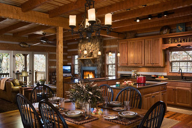 Inspiration for a large rustic l-shaped dark wood floor eat-in kitchen remodel in Raleigh with an undermount sink, raised-panel cabinets, medium tone wood cabinets, brown backsplash and an island