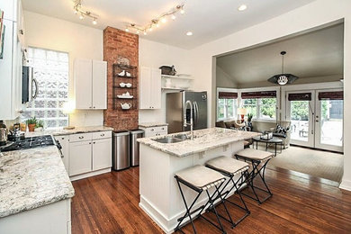 Example of a transitional kitchen design in Louisville