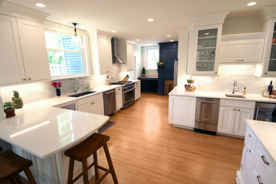 Example of a large trendy eat-in kitchen design in St Louis with no island