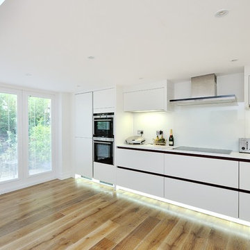 Classic Pure White Matt Handleless Kitchen with handrail detail