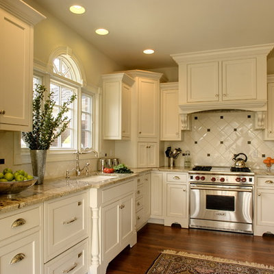 Kitchen - traditional l-shaped kitchen idea in Indianapolis with granite countertops, an undermount sink, beaded inset cabinets, white cabinets, white backsplash and stainless steel appliances