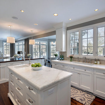 Classic White Cabinetry with White/Grey Stone Counter-Tops
