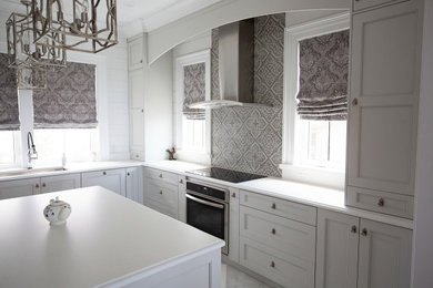 Eat-in kitchen - large french country u-shaped marble floor, white floor and tray ceiling eat-in kitchen idea in Miami with a drop-in sink, shaker cabinets, gray cabinets, quartzite countertops, white backsplash, stainless steel appliances, an island and white countertops