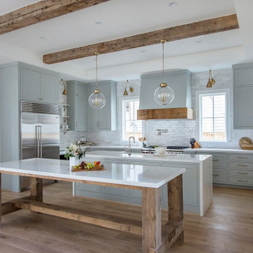 Clean & Modern White Farmhouse on E. 10th St.