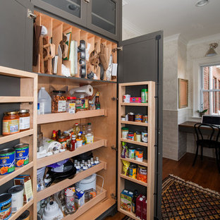 Transitional kitchen pantry pictures - Example of a transitional kitchen pantry design in Chicago with gray cabinets