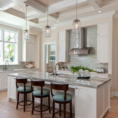 Kitchen - coastal kitchen idea in Miami with an island