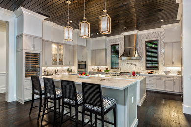 Transitional u-shaped dark wood floor kitchen photo in Miami with marble countertops, mosaic tile backsplash, two islands, shaker cabinets, gray cabinets, gray backsplash and stainless steel appliances