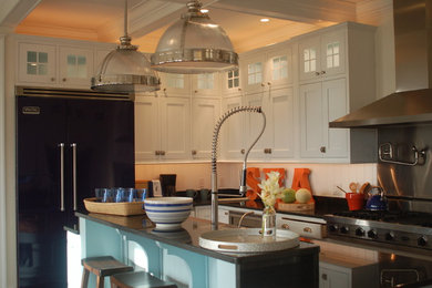 Inspiration for a coastal kitchen remodel in Boston with beaded inset cabinets, white cabinets, granite countertops, white backsplash and an island